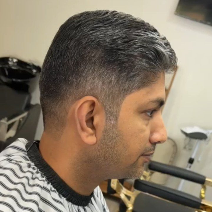 Side profile of finished salt and pepper cut at Nasim Barbershop